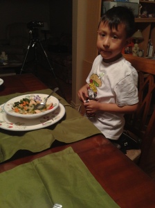 Anthony enjoys the healthy dinner his mother prepared